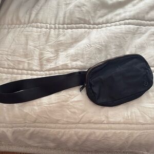 Lululemon black sling bag